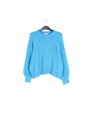 Light blue cable-knit sweater