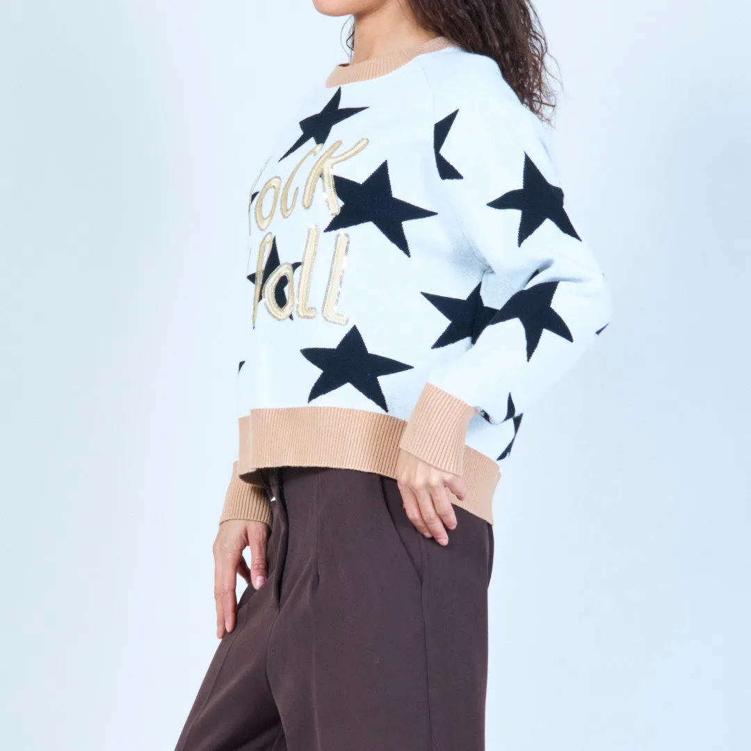 Star print sweater with "Rock & Roll" design wholesale